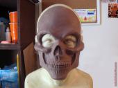 Human skull mask sculpture - front view