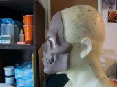 Human skull mask sculpture - side view