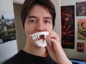 Silly picture of me holding cast resin turian jaw set to my mouth